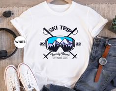 Custom Family Vacation Shirt, Family Ski Trip Tshirt, Matching Skier T-shirt, Winter Sports Outfit, Mountain Tee, Christmas Holiday Gifts HOW TO ORDER: - Please, check and review all the photos. - Select your T-shirt size from the selection box. - Select your T-shirt color from the selection box. - Personalization box is only for design color information, enter your design or text color in the personalization box (see images for options) UNLESS otherwise indicated. - Select the quantity. - Add to cart. - Complete checkout! TSHIRT DETAILS: * All solid colors are 100% cotton * All heather colors are 52% cotton, 48% polyester * Shoulder taping * Side-seamed * UNISEX SIZING, not a Women's size! * Retail fit * Pre-shrunk * Tear away the label PRODUCTION AND SHIPPING PROCESS *The production time White Relaxed Fit T-shirt For Outdoor Activities, Sporty Sublimation Print Tops For Outdoor Activities, Sporty T-shirt With Logo For Outdoor Activities, Sporty Logo Print T-shirt For Outdoor Activities, White Sporty T-shirt For Outdoor, Casual Graphic Print Top For Skiing, White Crew Neck Top For Snowboarding, White Tops With Sublimation Print For Outdoor Activities, White Tops With Sublimation Print For Outdoors