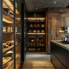 a kitchen with lots of shelves filled with food and cooking utensils in it