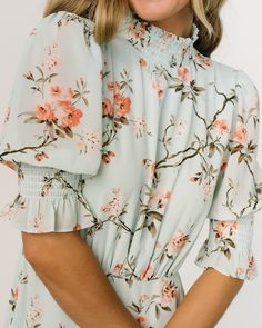 Hold the phone!!! We just found THEE most perfect spring dress🫢 Sorry, but if this dress isn't in your spring rotation, you're doing it wrong🤪 Shop our Marie Mock Neck Maxi Dress now🌸🛍️ Flowy Smocked Top For Spring, Spring Flowy Smocked Top For Brunch, Feminine Flowy Smocked Top With Floral Print, Chic Floral Print Smocked Top For Spring, Chic Spring Floral Smocked Top, Elegant Spring Smocked Top With Elastic Neckline, Spring Smocked Top With Smocked Back, Fitted Smocked Top With Floral Print For Daywear, Elegant Smocked Back Top For Spring