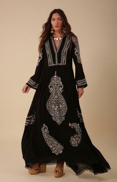 Bohemian Dresses With Floral Embroidery And 3/4 Sleeves, Bohemian Dress With Ruffle Hem, Bohemian Embroidered Tiered Dress, Bohemian Long Sleeve Maxi Dress With Intricate Embroidery, Elegant Long Sleeve Boho Dress For Festival, Flowy Embroidered Long Sleeve Dress, Fitted Embroidered Dress With 3/4 Sleeves, Long Sleeve Embroidered Dress With Ruffles, Bohemian Long Sleeve Maxi Dress With Embroidered Hem