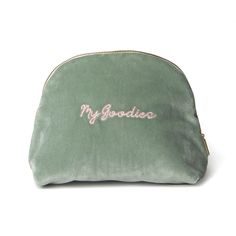 a green pouch with the word my godda written on it and pink writing across the front