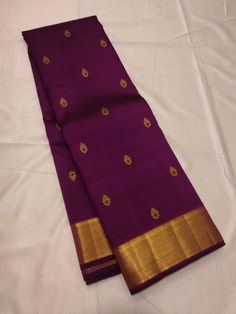 Bridal Collection Deep Purple Color Pure Kanchipuram Silk Saree | Indian Traditional Ethnic Saree | Wedding or Party Wear Saree | Handwoven Gift Saree for Her Product Details : Saree Type : Pure Kanchipuram Silk Saree Golden Zari, Silk Mark Certified Blouse Piece : Yes (Un-Stitched) Saree Length : 5.5 Meters Blouse Piece Length : 80 cm Saree Weight : 0.9 kg Saree Fabric : Pure Kanchipuram Silk  Color : As shown in the picture Work : weaving Pattern : designer Occasion: Party Wear, Formal Wear, F Purple Handloom Lehenga For Wedding, Tissue Silk Churidar With Pallu For Festivals, Traditional Drape Tussar Silk Churidar For Wedding, Gold Tussar Silk Churidar For Wedding, Purple Churidar For Wedding With Pallu Detail, Wedding Churidar In Purple With Self Design, Wedding Tissue Silk Saree With Motifs, Wedding Purple Churidar With Self Design, Traditional Purple Churidar With Pallu