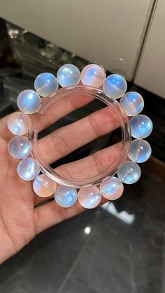 Material:moonstone beads size :Approx 13mm   quantity: one strand  6mm approx 29 pcs one strands 7mm approx25 pcs one strands 8mm approx 22 pcs one strands 9mm approx 21pcs one strands 10mm approx 19 pcs one strands 11mm approx 18pcs one strands 12mm approx 16 pcs one strands 13mm approx 16 pcs one strands 14mm approx 15 pcs one strands 15mm approx 14pcs one strands 16mm approx 14 pcs one strands 17mm approx 13pcs one strands 18mm approx 13pcs one strands 19mm approx 12pcs one strands 20mm appro Moonstone Crystal Bracelet With Round Beads As Gift, White Moonstone Round Crystal Bracelet, Moonstone Crystal Bracelet With 8mm Round Beads, Moonstone Crystal Bracelet With Round 8mm Beads, Hand-strung Moonstone Crystal Bracelet, Hand-strung Round Moonstone Beaded Bracelets, Moonstone Beaded Bracelets For Healing, Hand-strung Moonstone Beaded Bracelets, Elegant Moonstone Crystal Bracelet With Round Beads