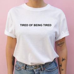 "Tired of Being Tired T-shirt Cool Casual Tumblr Grunge Tee AVAILABLE SIZES: S,M,L,XL,2XL,3XL COLOR: WHITE, BLACK, HEATHER GREY CONDITION: BRAND NEW T-SHIRT SPECS : 100% high quality pre-shrunk cotton (165 g/m2) jersey). Taped neck and shoulders, twin needle stitching, seamless collar. PRINT: Highest quality print - not cheap \"iron-on\" transfers! MEASUREMENTS : width - armpit to armpit ; length - the body length is measured in a straight line from the highest point of the shoulder at the join Outfits 90s Hip Hop, Vaporwave Shirt, Tumblr Grunge, Tumblr T Shirt, Urban Apparel, Grunge Tee, Outfit 90s, Hip Hop Outfits, Indie Outfits