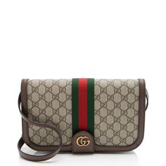 The Italian Fashion House Of Gucci Continues To Reinterpret Its Rich Heritage Under Current Creative Director Alessandro Michele (2015). Maintaining A Balance Between Historical Reference And Contemporary Eclectic Flare, The Brand’s Signature “Double G” Remains Iconic. Gucci Has Been Recognized As A Worldwide Leader In The Luxury Goods Market For 90 Years. Condition: Pristine - Minor Marks And Wear Throughout Interior. Mark To Interior Coated Canvas. Material: Coated Canvas, Leather, Nylon Origi Gucci Gucci, Contemporary Eclectic, Alessandro Michele, S Signature, Luxury Goods, Fashion House, Italian Fashion, Clutch Handbag, Creative Director