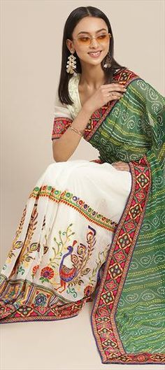 Green, White and Off White color Saree in Georgette fabric with Bandhej, Embroidered, Printed, Thread work White Wedding Blouse Piece With Motifs, Multicolor Embroidered Border Blouse Piece For Wedding, Multicolor Embroidered Blouse Piece For Wedding, Multicolor Embroidered Wedding Blouse Piece, Wedding Multicolor Blouse Piece With Embroidered Border, Fitted White Saree With Motifs, Festive White Fabric With Pallu, Festive White Embroidered Fabric, Festive White Fabric With Motifs