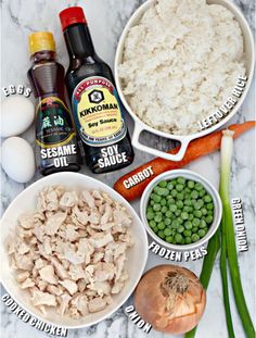 ingredients to make chicken and rice casserole laid out on a marble counter top