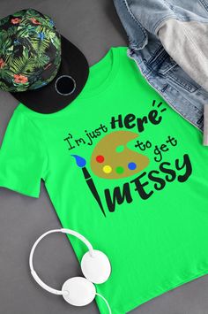 This is the perfect shirt for that special creative party! Or an everyday shirt for an enthusiastic young artist!  T-Shirts are 100% pre-shrunk cotton with high-quality, premium vinyl designs.  This shirt comes with a design for those celebrating a birthday (It's My Birthday, Let's get Messy) or those just celebrating (I'm Just Here to Get Messy).  Shirts are sold individually, to create a set simply add additional shirts to your cart one at a time. ♥PURCHASE OPTIONS Please note that the primary Fun Green T-shirt For School, Fun Green T-shirt For Birthday, Fun Graphic Print T-shirt For School Events, Green Fun Birthday T-shirt, Playful Graphic Print T-shirt For School Events, Fun Multicolor T-shirt For School Events, Playful Green T-shirt For Birthday, Kids Paint Party, Kids Painting Party