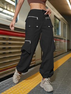 Experience rugged style and practicality with our Street Flap Pocket Cargo Pants. Designed for casual wear, these plain-patterned pants feature a zipper fly and a natural waistline for a comfortable fit. With a regular fit and long length, they offer freedom of movement while maintaining a trendy look. The non-stretch fabric ensures durability, making them perfect for any adventure. Details: Style: Casual Pattern Type: Plain Type: Cargo Pants Closure Type: Zipper Fly Waist Line: Natural Length: Black Cargo Pants With Zip Fly For Fall, Casual High Waist Bottoms With Zip Fly, Utility Pants With Zipper Closure For Fall, Urban Cargo Trousers For Outdoor, Urban Cargo Jeans For Outdoor, Streetwear Pants With Zipper Closure, Straight Cargo Style Bottoms For Outdoor, Full Length Pants With Zipper For Streetwear, Straight Cargo Style Pants For Outdoor