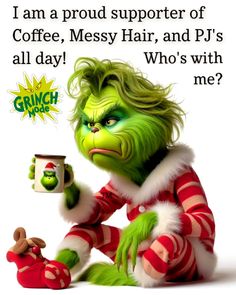 the grinch is holding a coffee mug