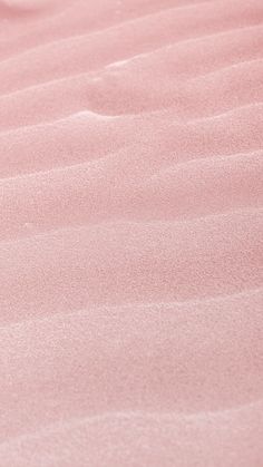 the sand is pink in color and it looks like something from another planet or space