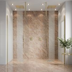 a bathroom with marble walls and flooring next to a plant in a vase on the side of the bathtub