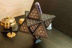 a wooden object sitting on top of a table