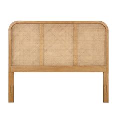 an upholstered headboard made out of wood and wicker, with a wooden frame