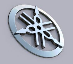 a circular metal emblem with scissors on the bottom and an arrow in the middle, against a gray background