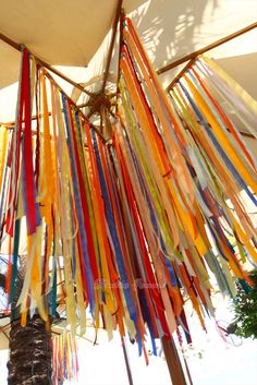 colorful streamers are hanging from the ceiling