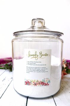 a jar filled with white powder sitting on top of a table