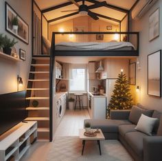 a living room with a couch, coffee table and stairs leading up to the loft