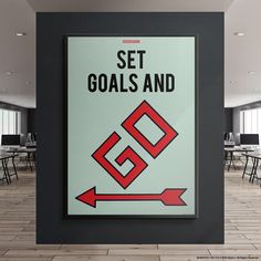 there is a sign that says set goals and go with an arrow pointing to the right