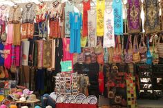 there are many different items on display in this market