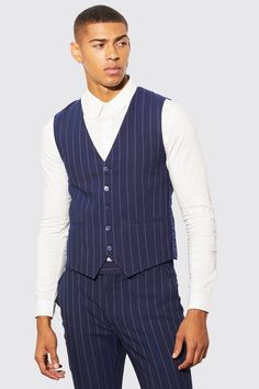 Don't be a wasteman, get a waistcoat! men's waistcoats, when worn well can sharpen up your standard suiting. Add the matching trousers and jacket for the ultimate 3-piece phenomenon. Tailored Pinstripe Sleeveless Vest, Pinstripe Tailored Sleeveless Vest, Tailored Sleeveless Pinstripe Vest, Classic Pinstripe Formal Vest, Classic Pinstripe Vest For Formal Occasions, Formal Striped Sleeveless Vest, Tailored Pinstripe Business Vest, Tailored Pinstripe Vest For Business, Classic Fitted Pinstripe Vest