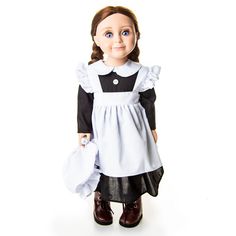 the doll is dressed in black and white