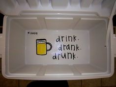 a sign that says drink drunk and has a mug in it on the side of a refrigerator