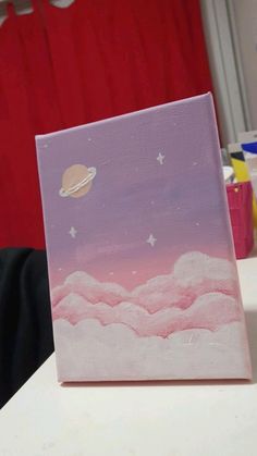 an acrylic painting of saturn in the sky with pink clouds and white stars