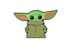 a green and orange baby yoda pin