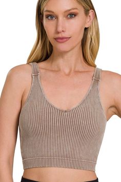 Experience ultimate comfort and an ultra flattering fit with our Fitted Ribbed Brami that includes removable bra padding. Ideal for layering or cute styled alone, this brami offers a stretchy and form-fitting silhouette with acid washed and ribbed fabrication. Color - Mocha Washed and ribbed fabrication Seamless Removable bra pads 90% Nylon, 10% Spandex Available in 4 colors Imported Stylish Tank Tops, Lace Tunic Tops, Lilac Grey, Flowy Design, Ruffle Trim Dress, Bralette Crop Top, Lace Tunic, Total Body, Padded Bras