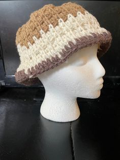 Crocheted summer hat Lightweight Brown Bucket Hat For Outdoor, Beige Crochet Hat For Vacation, Beige Crochet Cap For Vacation, Beige Crochet Vacation Cap, Casual Crochet Hat With Adjustable Short Brim, Adjustable Casual Crochet Hat With Short Brim, Casual Wide Brim Mini Hats For Winter, Winter Vacation Bucket Hat, Casual Crochet Hat With Short Brim For Outdoor