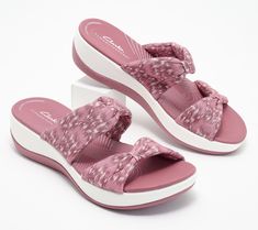 Is a trip to the shore in your future? Slip into these supremely comfortable slides and you're ready for a day of boardwalk strolls and sightseeing. From Clarks Footwear.\n\nOriginal item is A574855. This product may be a customer return, vendor sample, or on-air display and is not in its originally manufactured condition. It may not be new. In some instances, these items are repackaged by QVC. Ladies Slides, Slip On Sandals, Sandals For Sale, Head Wrap, Head Wraps, Slide Sandals, Slip On Sandal, Slides, Fashion Shoes