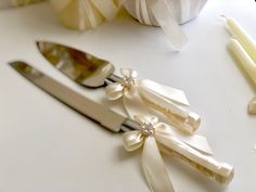 wedding cake knifes and forks on a table