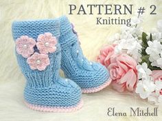 a pair of blue knitted boots with pink flowers on them and the words pattern 2 knitting written below