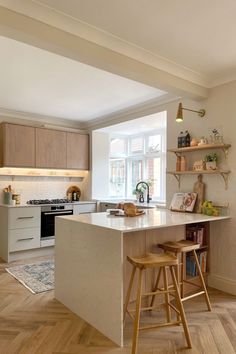 an image of a kitchen setting with stools