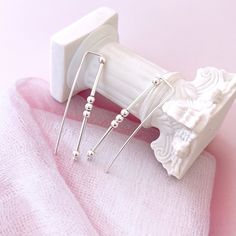 "This ear climber earring is a piece of jewelry that stands out for its unique and innovative design. You can wear it in a single earlobe piercing like any other earring, but getting the appearance of multiple piercings. It is perfect for a casual but edgy look. It is a good gift option. 👉🏼Details: ♥ Material: High-Quality Solid 925 Sterling Silver. ♥ Hypoallergenic, suitable for sensitive ears. ♥ Nickel-free and lead-free. ♥ Sold as a single earring or as a pair. 📏 Dimensions: ♥ Length:4 cm Ear Pins Earrings, Claw Earrings, Silver Ear Climbers, Double Sided Earrings, Ear Crawler, Ear Climbers Earrings, Dragon Earrings, Ear Jacket Earring, Multiple Piercings