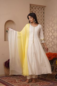 Let your ethnicity take the stage with this White Embroidered Cotton Kurta with Pants Set. This three-piece set includes a kurta with pants and dupatta. The White cotton kurta comes with hand embroidery, a round neckline and full sleeves. The  COLOUR: White MATERIALS: Cotton CARE: Dry Clean Only Size Chart THESE ARE GARMENT MEASUREMENTS (IN INCHES)  XSSMLXLXXL Chest343638404244 Waist303335373941 Hip363840424446 Shoulder13.51414.51515.515.5 Kurta Length484848484848 Pants Length393939393939 We acc White Long Semi-stitched Kurta, White Cotton Embroidered Straight Kurta Fabric, Off-white Embroidered Straight Kurta, White Resham Embroidered Straight Kurta Fabric, White Resham Embroidered Floor-length Kurta, Kurti Sets, Cotton Kurta, Kurta With Pants, Full Sleeves