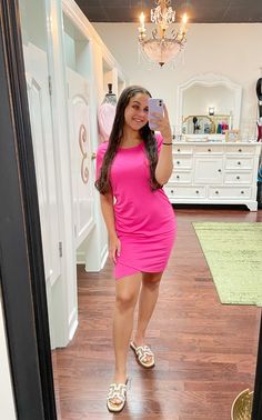 Look hot and stay comfortable in our Addison Dress! This pink-hot short sleeve number features a ruched side and a killer combo of 60% polyester, 35% cotton, and 5% spandex so you can keep cool and look cute all day long. Put the "Fierce" in "Fashionable" with this stylish dress!