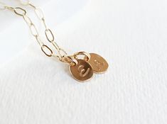 "Oval Initial Necklace, Paperclip Chain, Personalized Necklace, Gift for Mom, Best Friend Gift, Oval Letter Necklace, Disc Monogram Jewelry Tiny oval custom hand stamped initial disc necklace is a simple yet elegant choice for everyday wear and the perfect necklace to layer other necklace with. This makes a great gift for any mom, sister, aunt, grandma or friend. |DESCRIPTION| . Made of 14k gold fill chain and hand stamped oval pendant . Hand stamped disc measures 8mm x 11mm or 5/16\" wide by a Oval Charm Necklaces As Gift, Oval Charm Necklaces For Gifts, Oval Link Chain Necklace With Charms For Gift, Oval Charm Necklaces With Adjustable Chain As Gift, Oval Charm Necklace With Adjustable Chain As Gift, Dainty Oval Chain Necklace As Gift, Dainty Oval Chain Necklace For Gift, Oval Chain Necklace For Gift, Oval Chain Necklace With Adjustable Chain For Gift