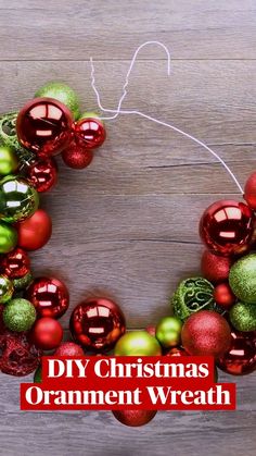 an ornament wreath with red and green ornaments