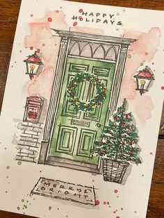 a christmas card with a green door and wreath on the front, which reads happy holidays