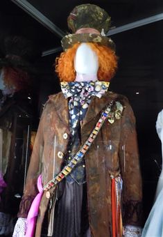 a mannequin dressed in clothes and accessories