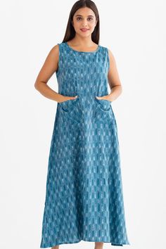 Our Neela Ikat Handloom Dresses are made with hand-woven 100% cotton material that is woven in the beautiful Ikat weaving style. Ikat weaving involves tie-dyeing the geometric pattern onto the yarn before the loom is set for weaving.  Featuring a comfortable & elegant design with pockets, these fair trade dresses are available in a range of colors in beautiful geometric weave patterns. Sevya's hand-woven textiles showcase the rich weaving traditions of India and are treasures that will last for generations. Available in two sizes, S/M and L/XL. Bohemian Cotton Dress With Weaving Work, Indigo Cotton Dresses With Natural Dye, Indigo Cotton Dress With Natural Dye, Bohemian Cotton Handloom Dress, Summer Indigo Ikat Print Dresses, Traditional Cotton Dress With Natural Dye, Cotton Beach Dresses With Woven Motifs, Ikat Weaving, Woven Textiles