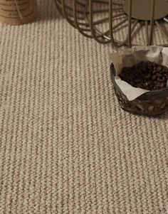 coffee beans are in a paper bag on the floor