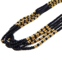 Presented by EclecticVintager,Elegant and classy multi strand beaded necklace in black with gold bead accents. Mid century necklace with five strands of lucite beads with a spring ring clasp. The necklace has a spring ring clasp in gold tone.  It's not about the jewelry it's about the sparkle in your eyes !  Approximate Measurements: 22.5 inches in length  Hallmark - unsigned Materials -lucite More vintage beaded necklaces - https://etsy.me/2qwEOYo My Etsy Shop - https://www.etsy.com/shop/Eclect Beaded Necklace Black, Gold Beaded Necklace, Multi Strand Beaded Necklace, Loop Pendant, Nags Head, Black Pearl Necklace, Purple Hats, Vintage Beads Necklace, Gold Bead Necklace