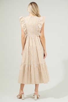 The Luna Striped Fairness Poplin Surplice Midi Dress has us planning our next summer vacation! Featuring a deep V neckline framed by ruffle details that act as an extended shoulder and trail down to the waistline. An effortless midi skirt maintains an A line silhouette with a single ruffle tier. Breathable cotton works to shape a flowy midi dress. Bring it on your next trip and style it with heels or sandals! - Surplice- Button snap- Breathable- Poplin- Color: Taupe MultiSize + Fit - Model is 5' Summer Beach Midi Dress With Ruffle Sleeves, Summer Midi Dress With Ruffle Sleeves, Summer Cotton Midi Dress With Ruffle Hem, Beach Cotton Midi Dress With Ruffle Hem, Cotton Ruffled Midi Dress For Vacation, Cotton Midi Dress With Ruffles For Vacation, Spring Taupe V-neck Dress, Beige V-neck Midi Dress With Ruffles, Casual Midi Dress With Gathered V-neck