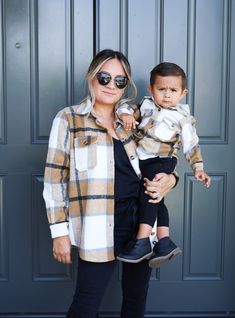 Model with toddler wearing matching brown white checkered flannel with pockets on the chest area. Perfect  fall outfit for mother, daughter and son Family Matching Plaid Shirts, Mom Son Outfits, Mommy And Son Matching Outfits, Mom And Son Matching Outfits, Mom And Son Outfits, Son Outfits, Mommy And Me Shirts, Outfits Matching, Fall Flannel