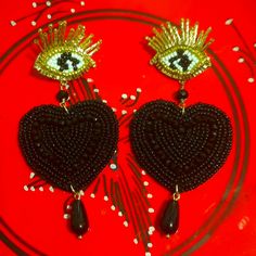 Eye Catching Beaded Eye Heart Post Earrings The Eye Is To Stare Off Evil. The Heart Is To Bring Love. Black & White Seed Beads Total Inch Is 3.5 Eye 1" Heart 1.5 By 1.5 Dangled Bead 1/2 " Beaded Dangle Heart Earrings For Parties, Handmade Black Dangle Heart Earrings, Handmade Black Heart Dangle Earrings, Dangle Beaded Earrings With Heart Beads For Party, Black Heart Earrings For Parties, Heart Shaped Beaded Earrings For Party, Heart-shaped Beaded Earrings For Party, Heart-shaped Beaded Party Earrings, Elegant Beaded Earrings With Heart Beads For Parties