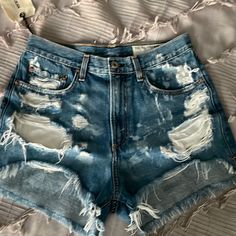 Nwt Cut Off Jeans. Super Distressed. Size 28 But Runs Small More Like 27 Ripped High Rise Summer Bottoms, Blue Ripped High Waist Shorts, High Waist Ripped Blue Bottoms, Fitted Ripped Blue Shorts, Blue Ripped Short Leg Bottoms, Ripped Blue Short Bottoms, Ripped Blue Shorts, Blue Ripped Short Bottoms, Summer Denim Shorts