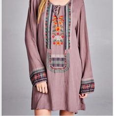 Wear This Free-Spirited Frock As A Tunic Or A Dress, Either Way You Will Be Looking Fabulous! The Floral Embroidery Is Stunning On Lightweight Gauze Fabric. 100% Rayon Nwt Model Is 5'5" Wearing Size Medium, Runs True To Size. Brown Embroidered Cotton Dresses, Bohemian Long Sleeve Mini Dress With Floral Embroidery, Fall Bohemian Dress With Multicolor Embroidery, Fall Tunic Dress With Embroidered Hem, Bohemian Embroidered Dress With Floral Print For Fall, Bohemian Embroidered Mini Dress For Fall, Bohemian Mini Dress With Embroidered Hem, Bohemian Embroidered Mini Dress, Tassel Embroidery